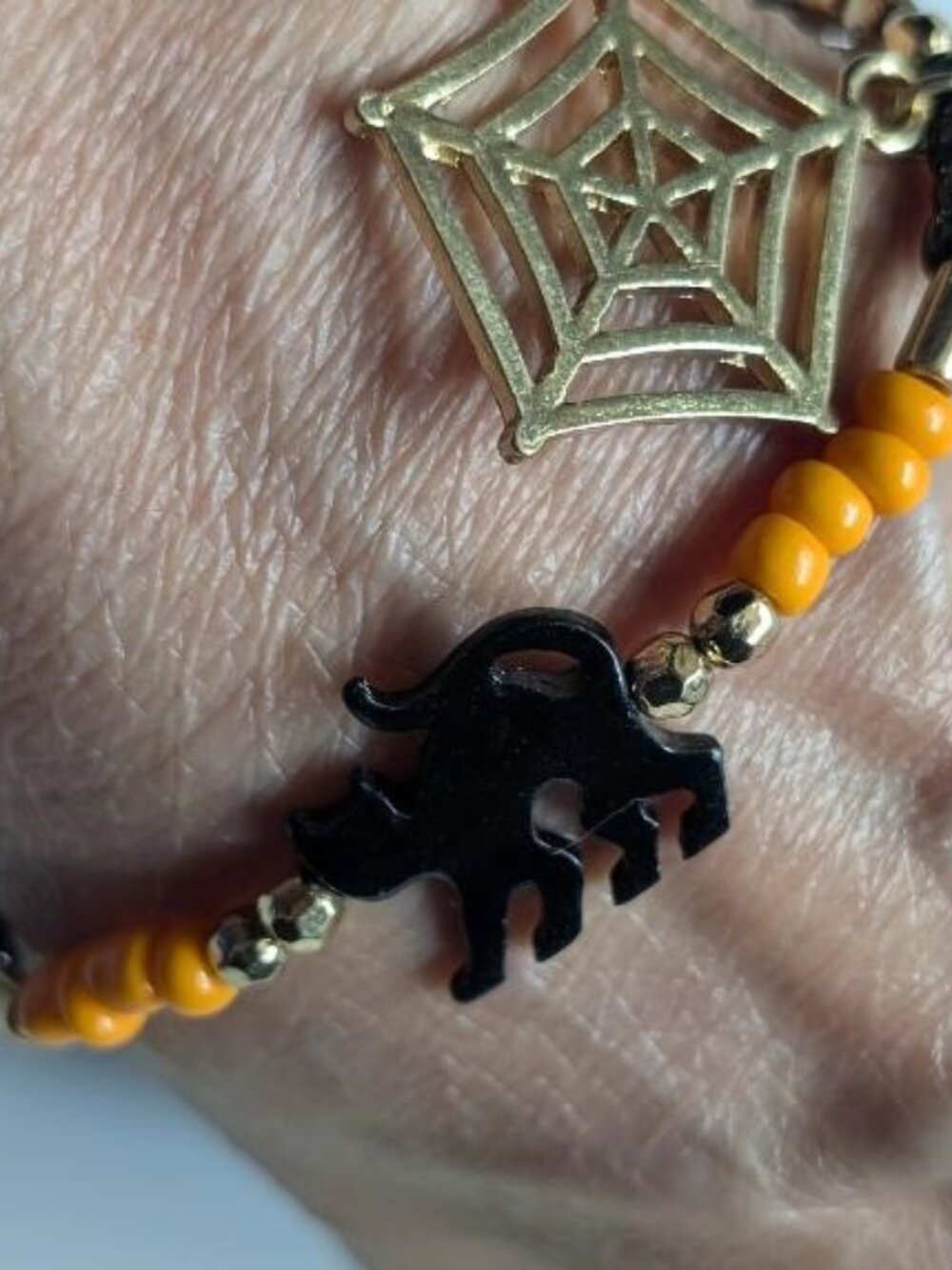 Vintage Halloween Beaded Bracelet with a Glass Cat and spider Web Charms